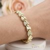 Bratara placata cu aur "Goldfilled" anti-alergenic, lungime 17 cm si grosime 8 mm, culoare 14K